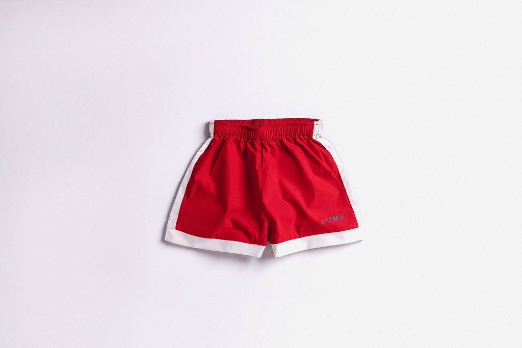 THE CHASE SWIM SHORT in RED